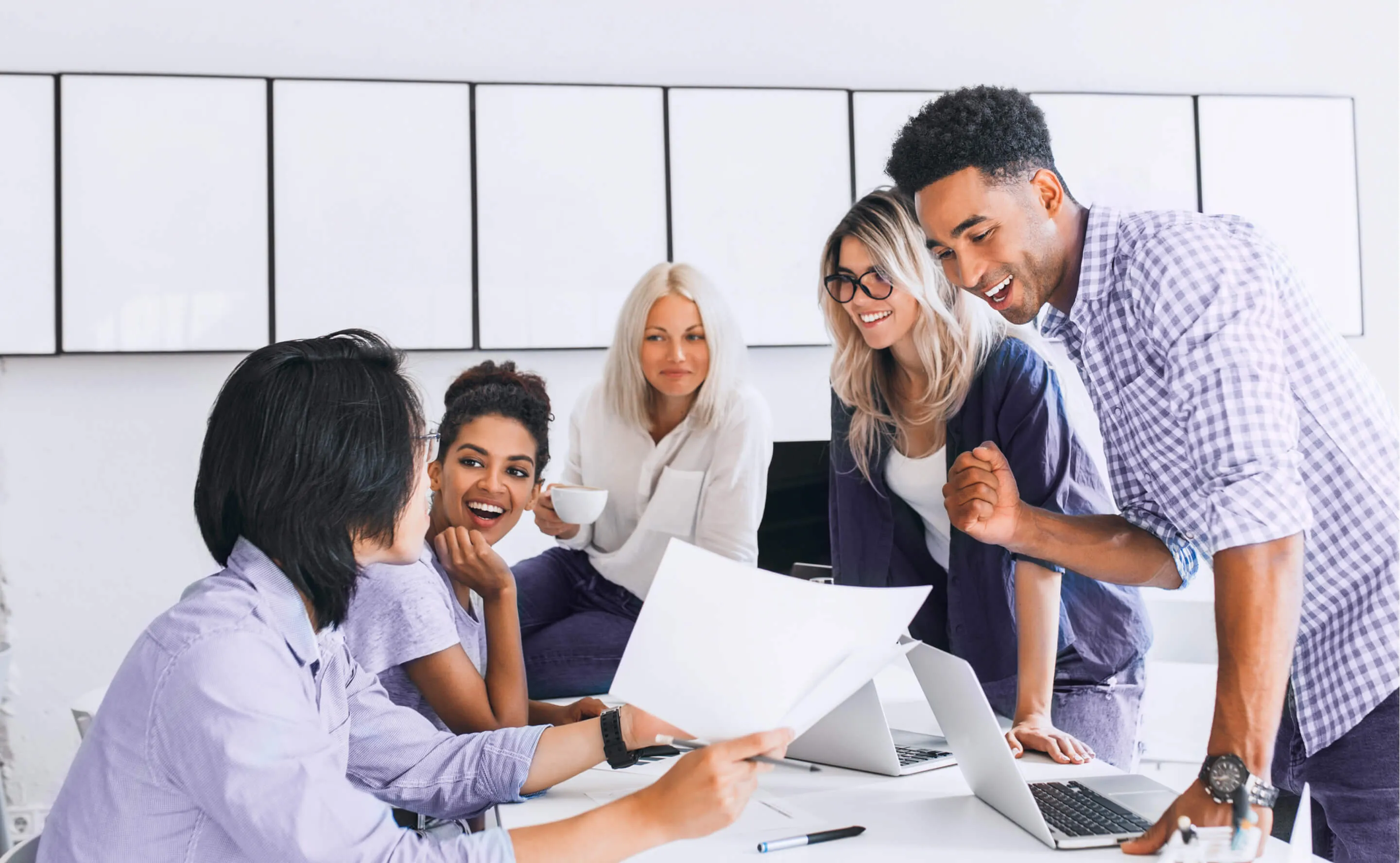 STEM professionals collaborating in a modern Cincinnati office environment